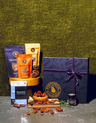 Gift Box w/ assortment of packaged goods surrounding